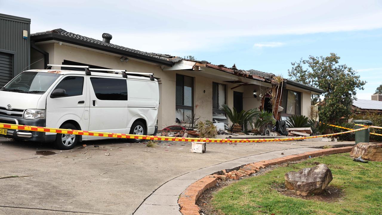 Driver Flees After Crashing Car Into House