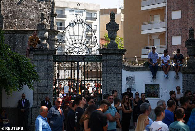 Mourners gathered outside the Chapel of the Resurrection, on the day of Jota and his brother Andre's funeral ceremony