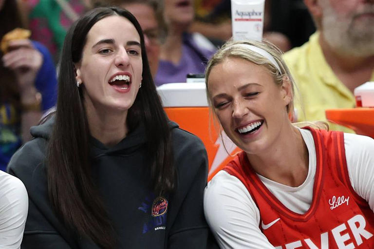 ARLINGTON, TEXAS - JUNE 27: Sydney Colson #51, Caitlin Clark #22 and Sophie Cunningham #8 of the Indiana Fever watch action during a game against the Dallas Wings at American Airlines Center on June 27, 2025 in Dallas, Texas. NOTE TO USER: User expressly acknowledges and agrees that, by downloading and or using this photograph, User is consenting to the terms and conditions of the Getty Images License Agreement. (Photo by Stacy Revere/Getty Images)