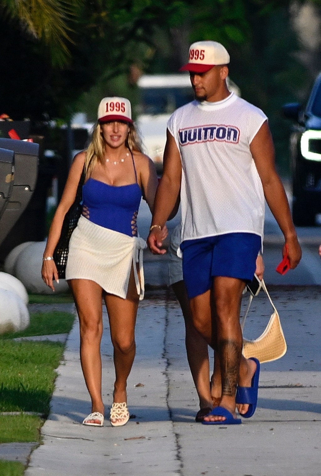 He and Brittany also rocked matching “1995” hats. BACKGRID