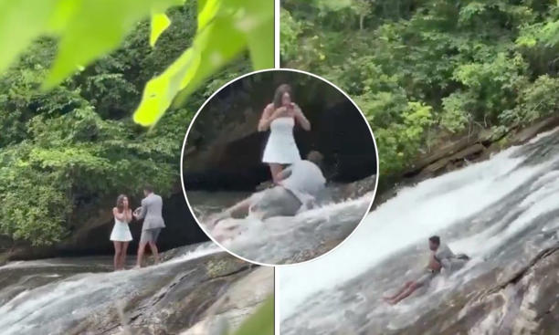 El hombre resbaló en la cima de la cascada