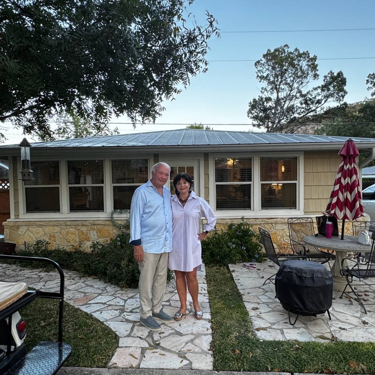 Mike and Charlene Harber in front of the cabin they owned earlier this year.