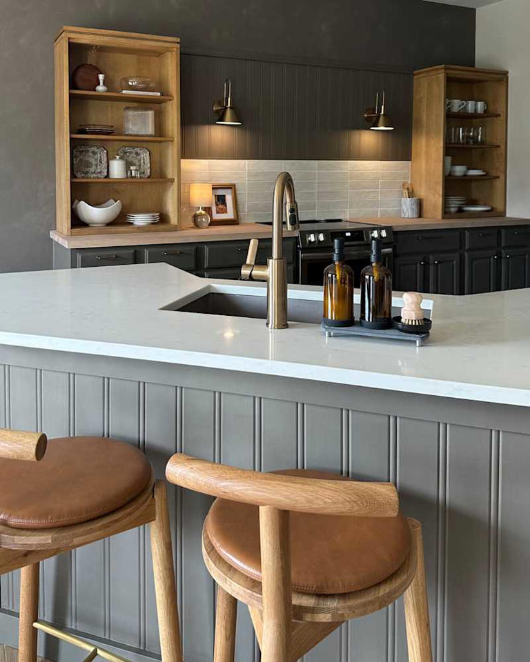 She saved $10,000 by painting her orangey kitchen cabinets