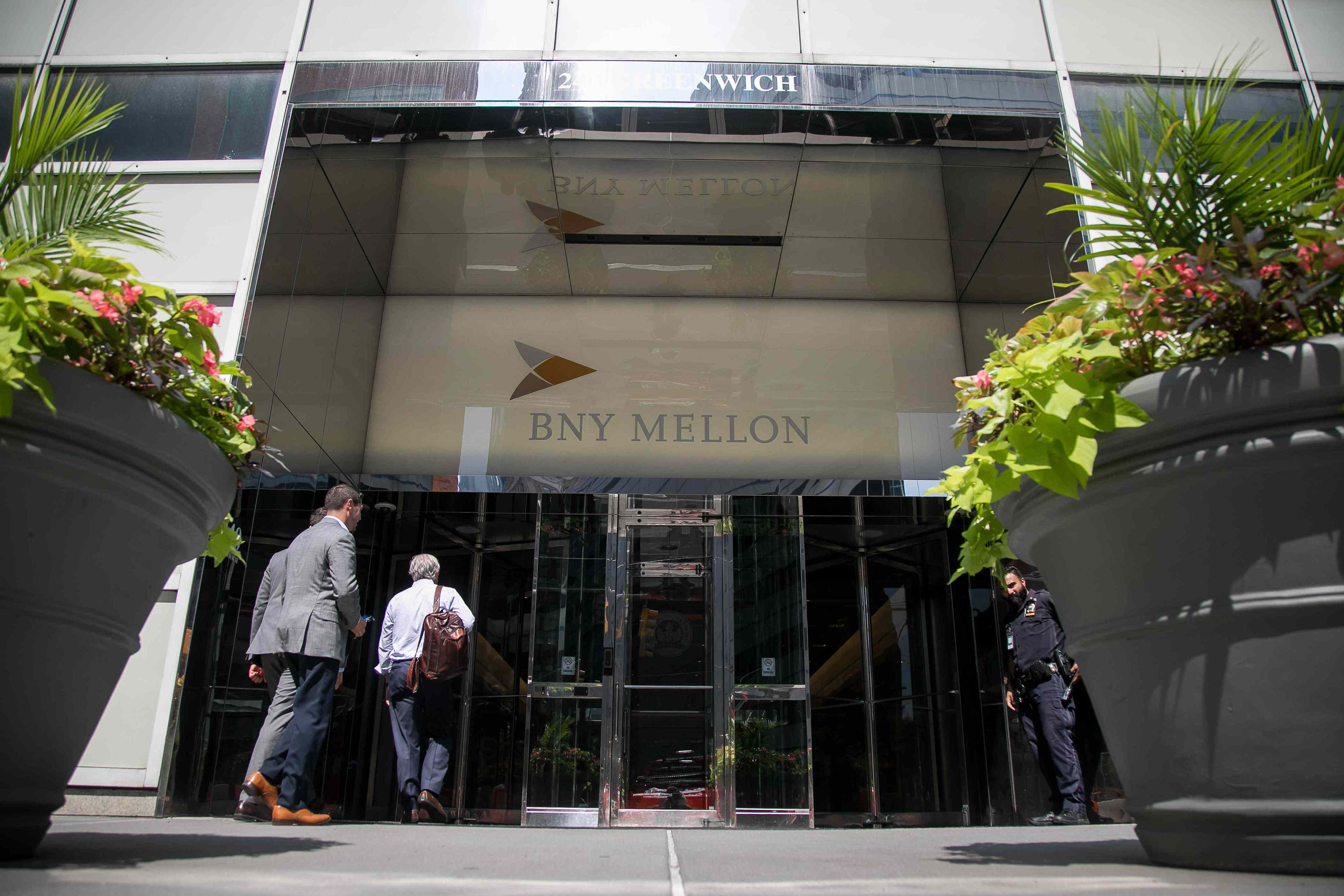 BNY Mellon Posts BetterThanExpected Earnings and Boosts Its Dividend