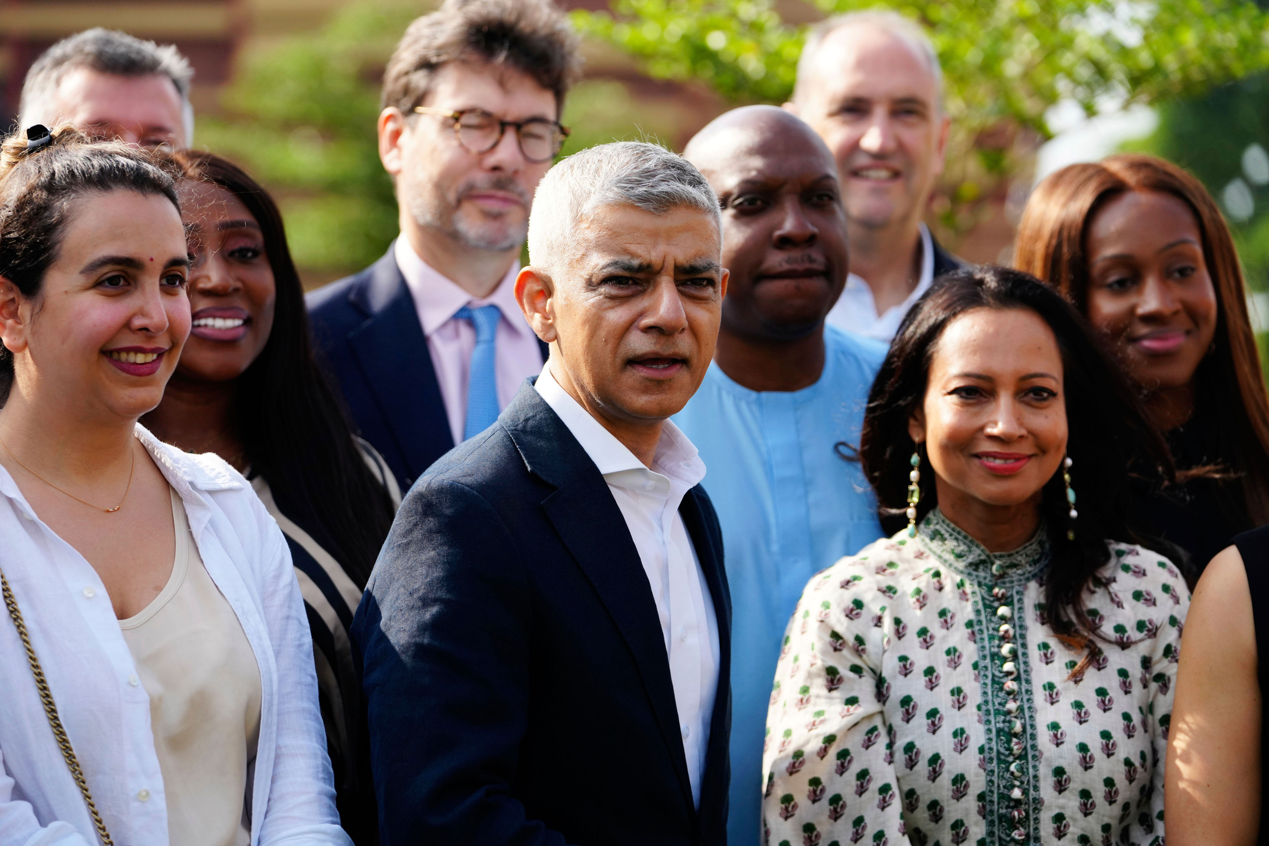 Sir Sadiq Khan, centre, before a major tech event at the John Randle Centre in Lagos, Nigeria ((AP Photo/Sunday Alamba))