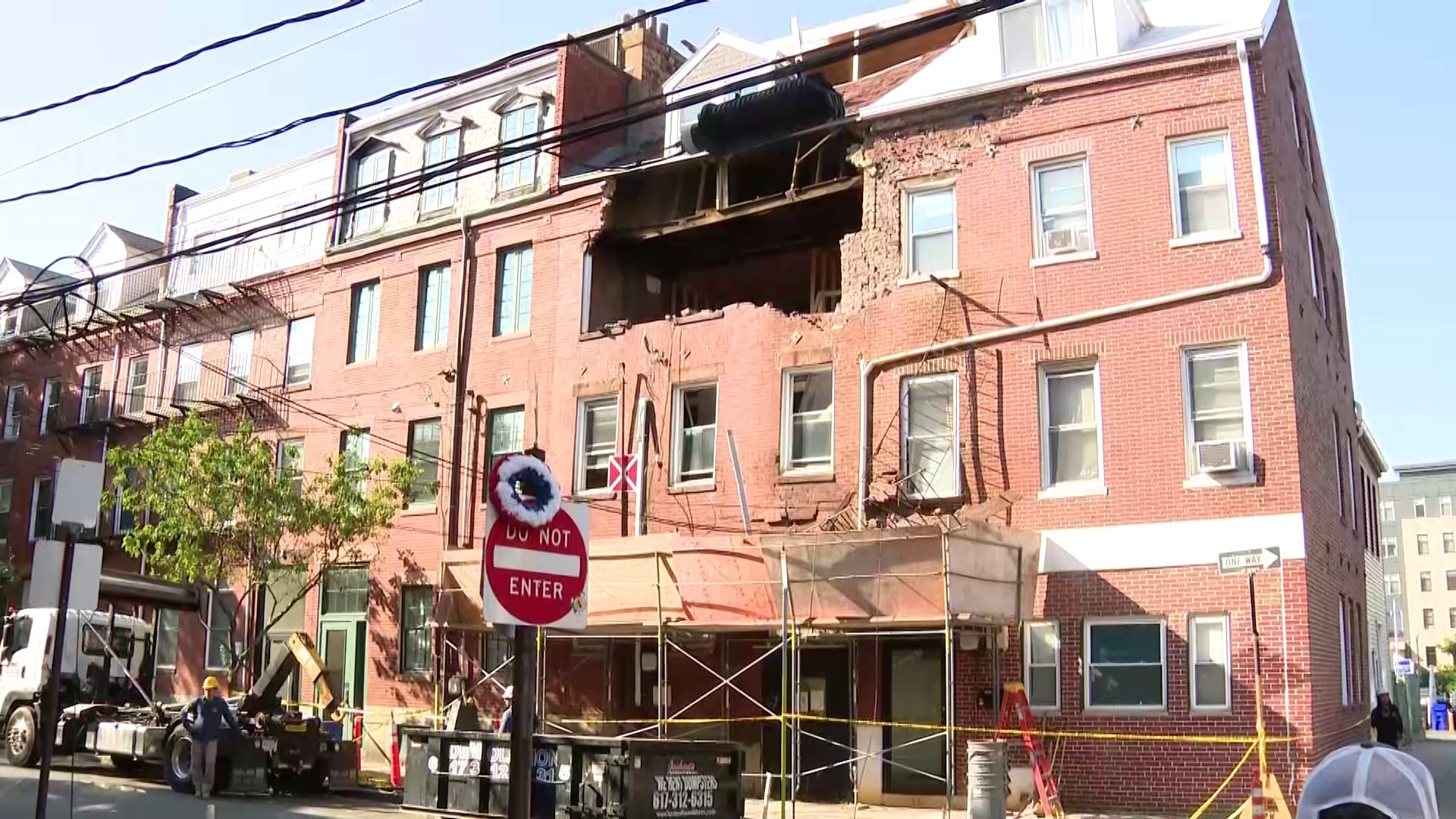 Falling bricks reported to city days before building's facade crumbles