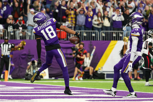 Minnesota Vikings wide receiver Justin Jefferson celebrates his touchdown.