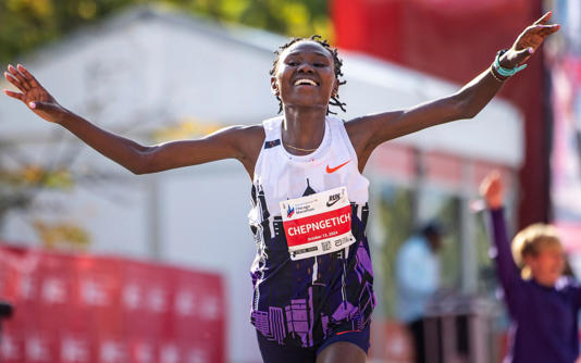 Ruth Chepngetich became the first woman to run a marathon in under two hours 10 minutes in Chicago last year - AP/Tess Crowley