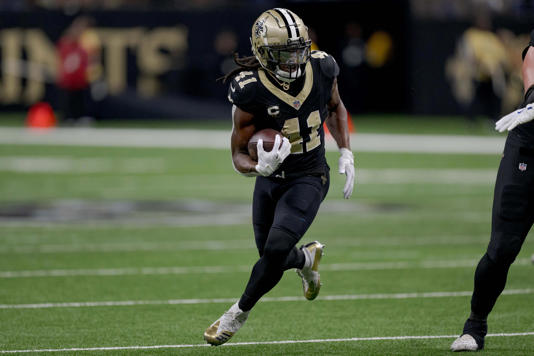 New Orleans Saints' Alvin Kamara runs against the Los Angeles Rams during the first half at Caesars Superdome.