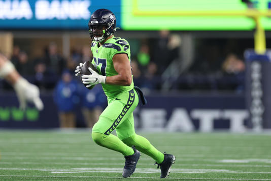 Noah Fant of the Seattle Seahawks catches a pass against the Green Bay Packers.