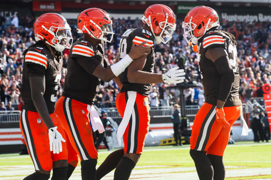Cleveland Browns wide receiver Cedric Tillman (19) celebrates with wide receiver Jerry Jeudy (3) and quarterback Jameis Winston (5) and running back D'Onta Foreman (27) after catching a touchdown pass.