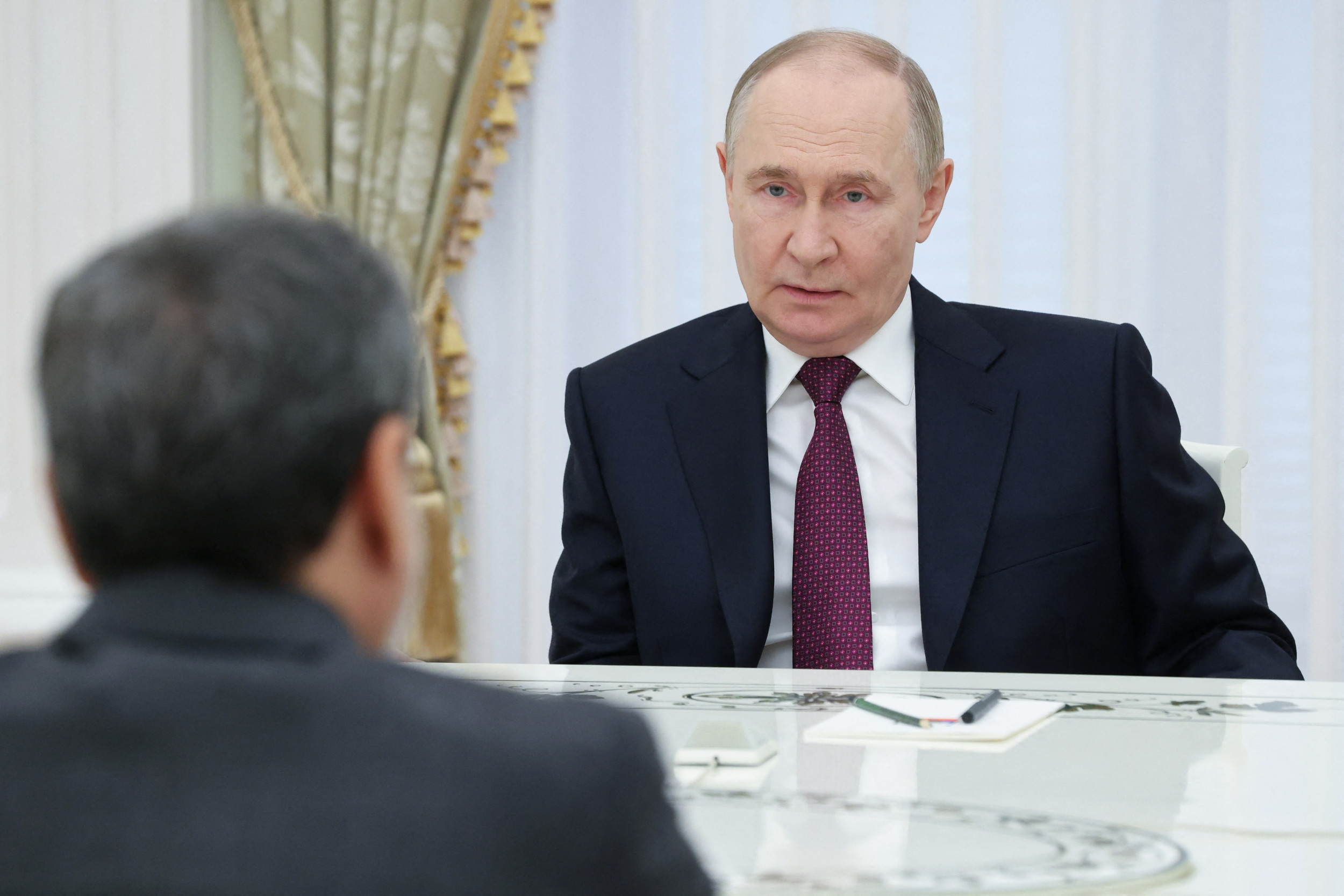 Russia's President Vladimir Putin meets with Iranian Foreign Minister at the Kremlin in Moscow on June 23, 2025. SERGEI KARPUKHIN/Pool/AFP/Getty Images