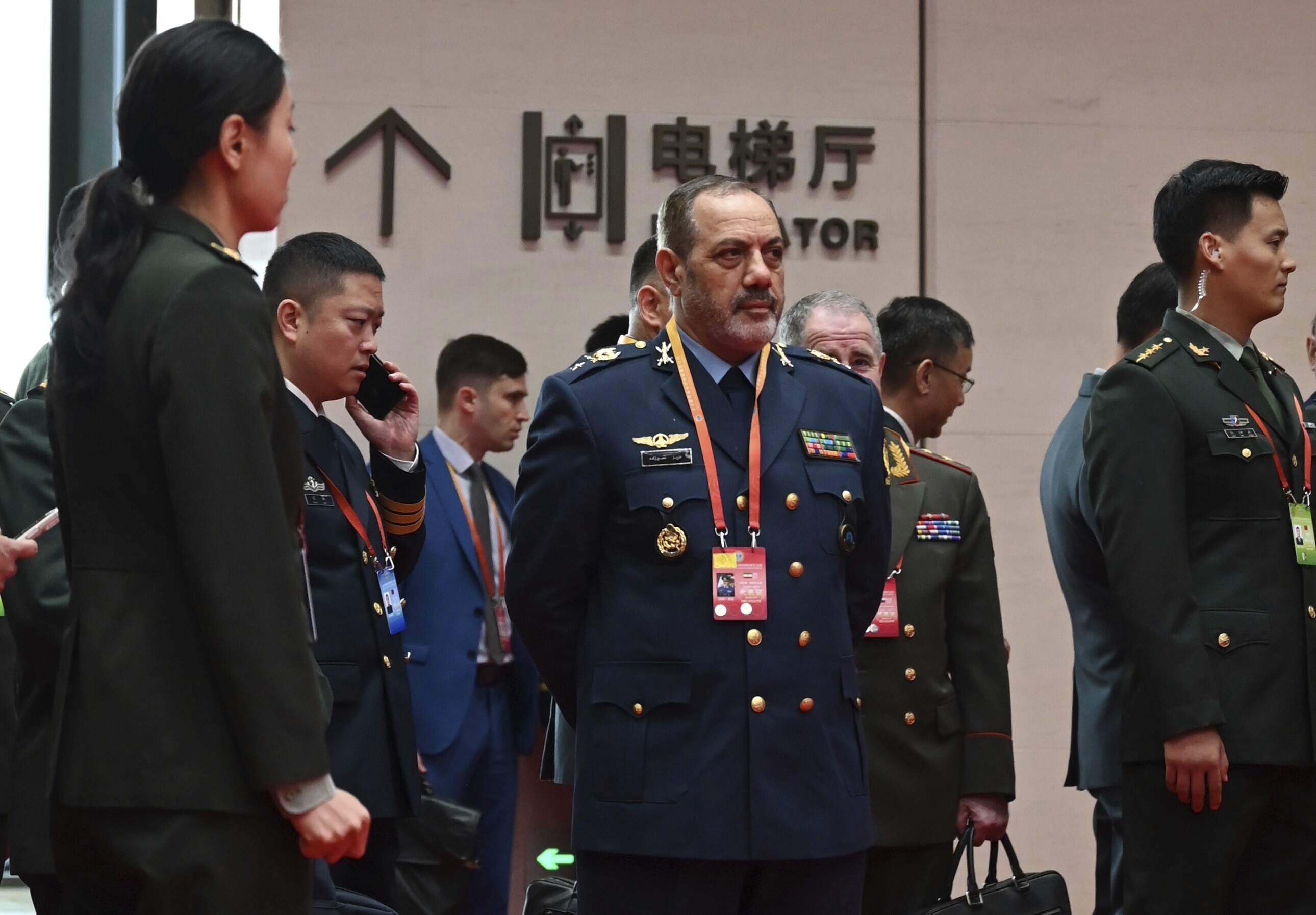 Iranian Defense Minister Aziz Nasirzadeh stands in the reception hall of the International Conference Centre in Qingdao during the Shanghai Cooperation Organization meeting alongside counterparts from eight other nations, including China and Russia, on June 25, 2025 Johannes Neudecker/Picture-Alliance/DPA/AP