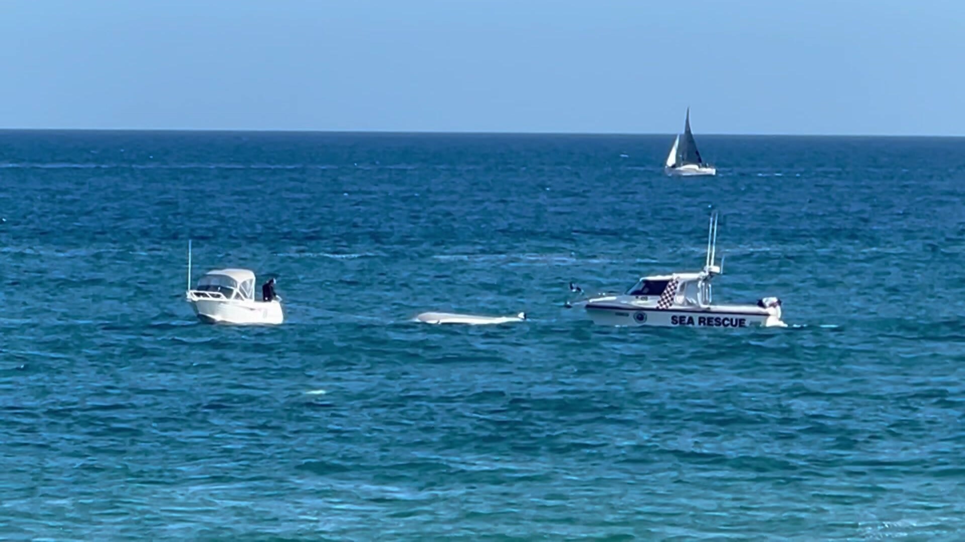 Boat carrying five people capsized off Christies Beach