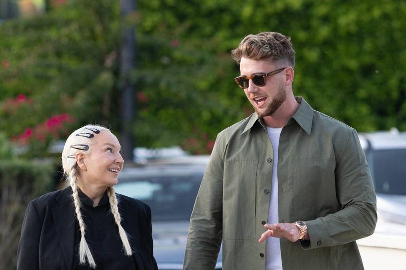 Sia, 49, and Too Hot To Handle star Harry Jowsey, 28, hold hands on date  during divorce