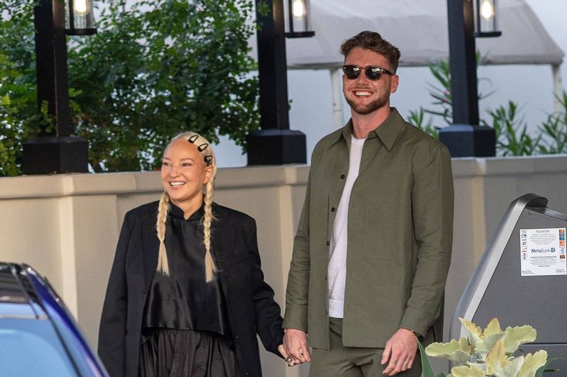 Sia, 49, and Too Hot To Handle star Harry Jowsey, 28, hold hands on date  during divorce