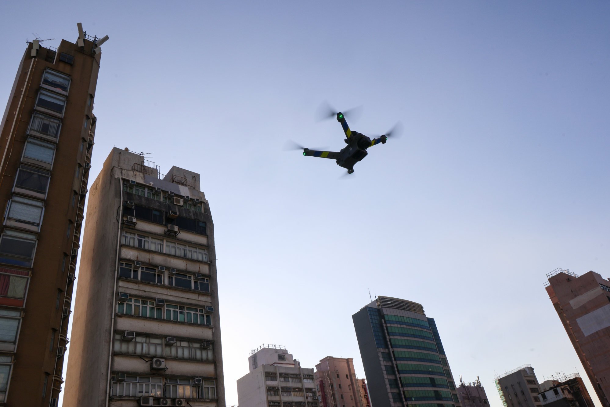 Hong Kong police chief vows technology push with robot dogs, CCTV and drones
