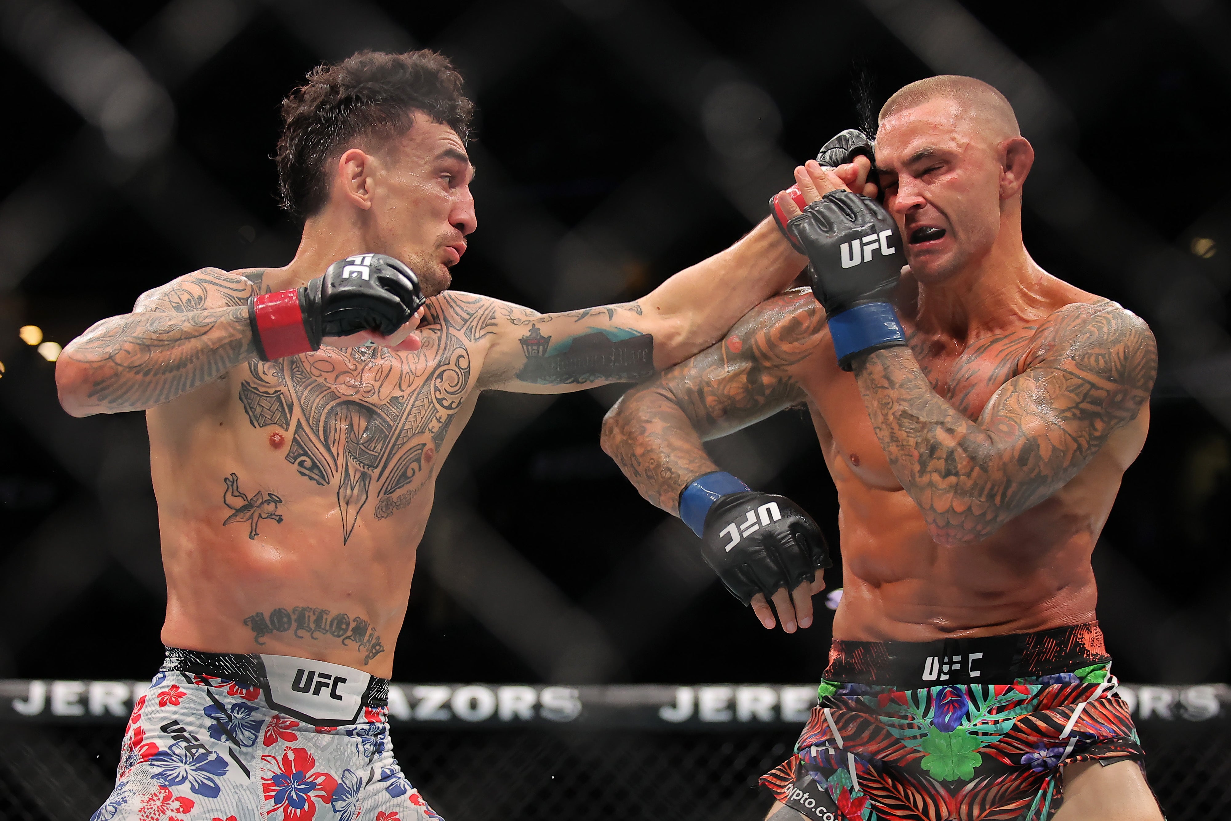 Max Holloway (left) beat Dustin Poirier in July (Getty Images)