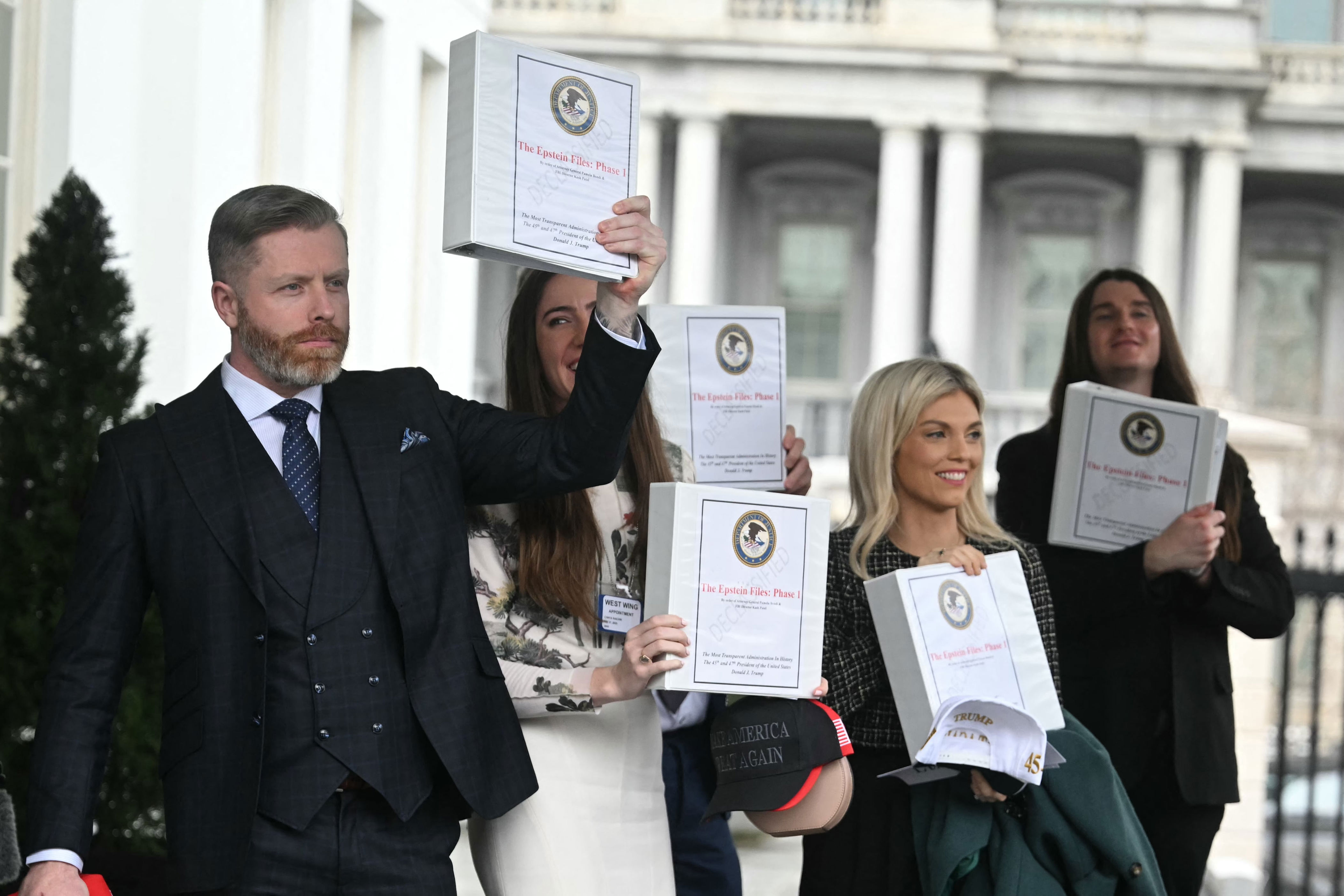 MAGA influencers were furious after Bondi's DOJ handed out binders of material on the Epstein case that was mostly already public. / Jim Watson / AFP via Getty Images