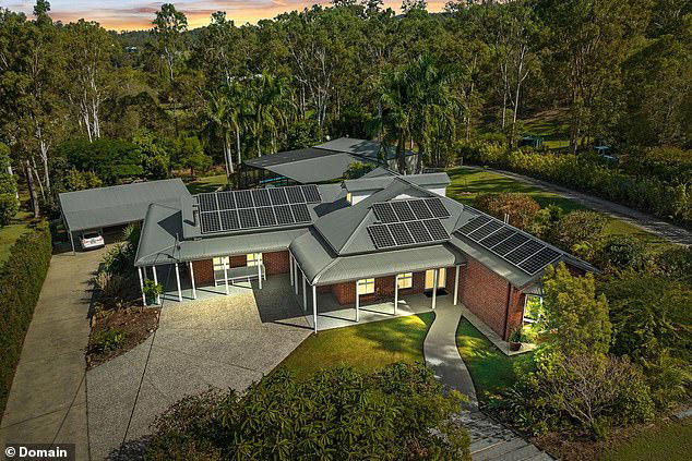 Walsh parted with $1.88million to buy a luxurious Gold Coast mansion (pictured) with eight bedrooms in May of 2024 - it is now said to be worth at least $2.4million