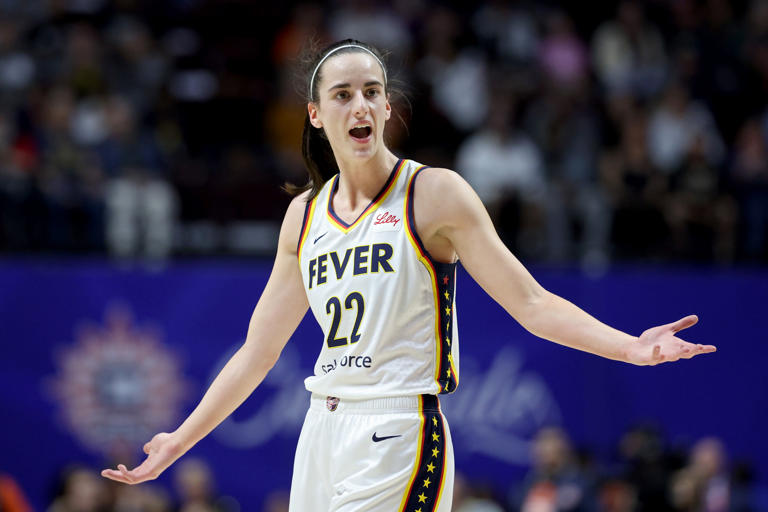 Caitlin Clark #22 of the Indiana Fever reacts after a foul during the first quarter against the Connecticut Sun in the game at Mohegan Sun Arena on May 14, 2024 in Uncasville, Connecticut.