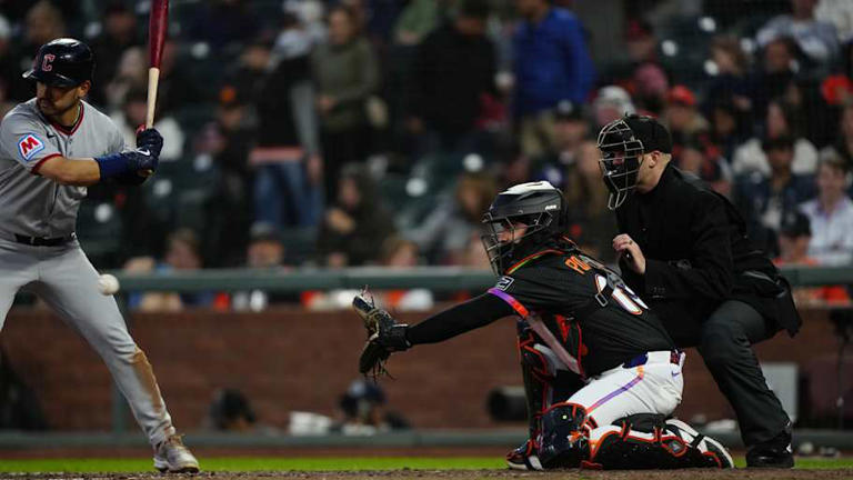 Multi-positional catcher clears waivers, re-signs minor league deal ...