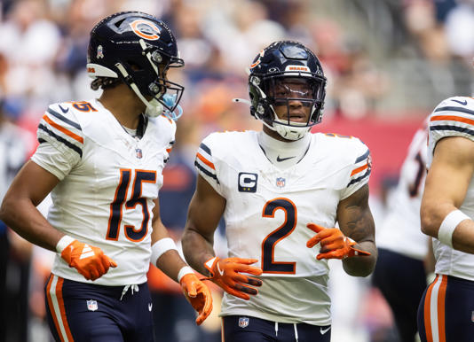 Nov 3, 2024; Glendale, Arizona, USA; Chicago Bears wide receiver DJ Moore (2) and Rome Odunze (15) against the Arizona Cardinals at State Farm Stadium. Mandatory Credit: Mark J. Rebilas-Imagn Images