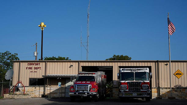An emergency siren is visible on top of the Comfort Volunteer Fire Department.