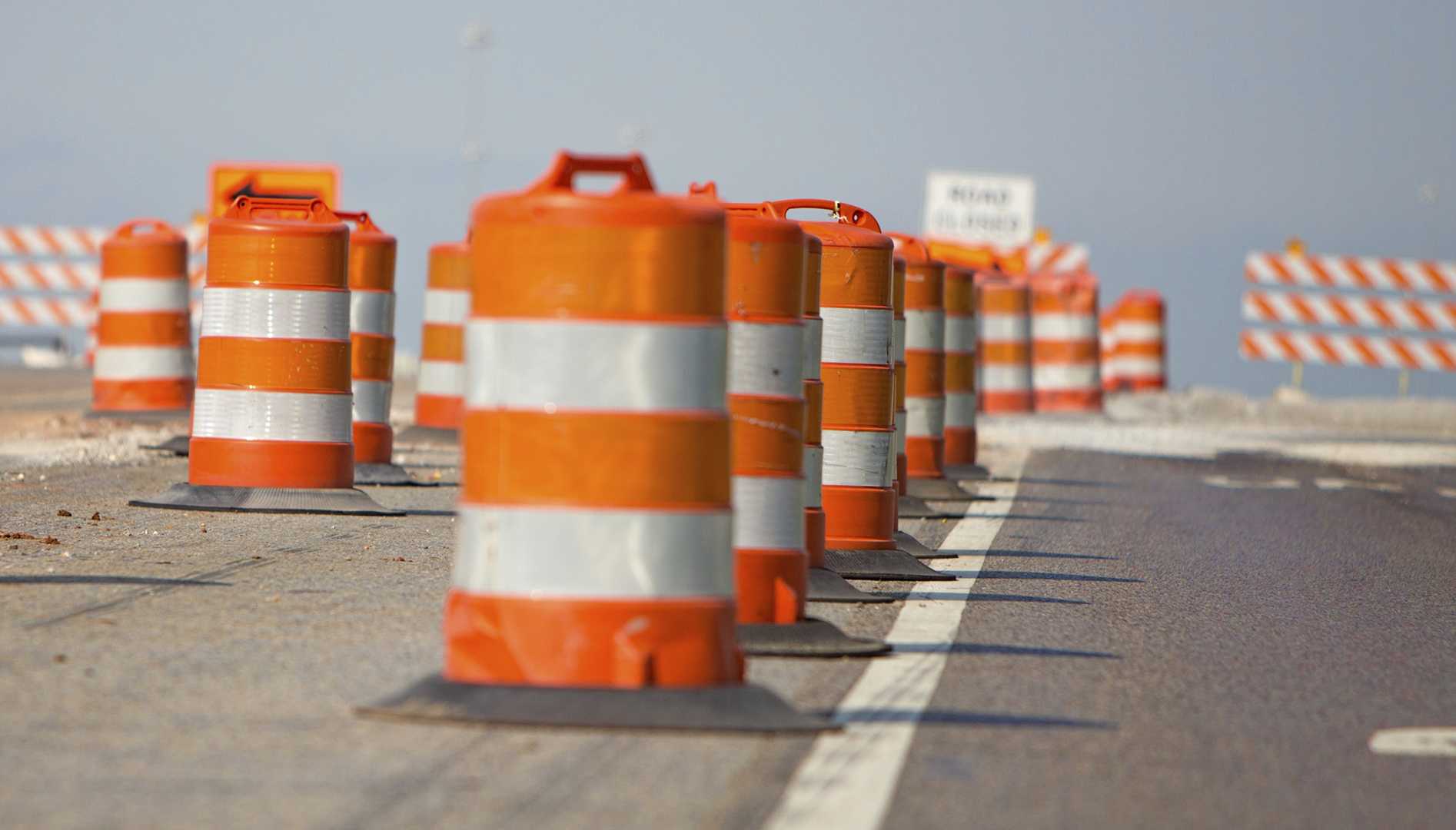 Speeding car hits deputy's vehicle during rolling roadblock, officials say
