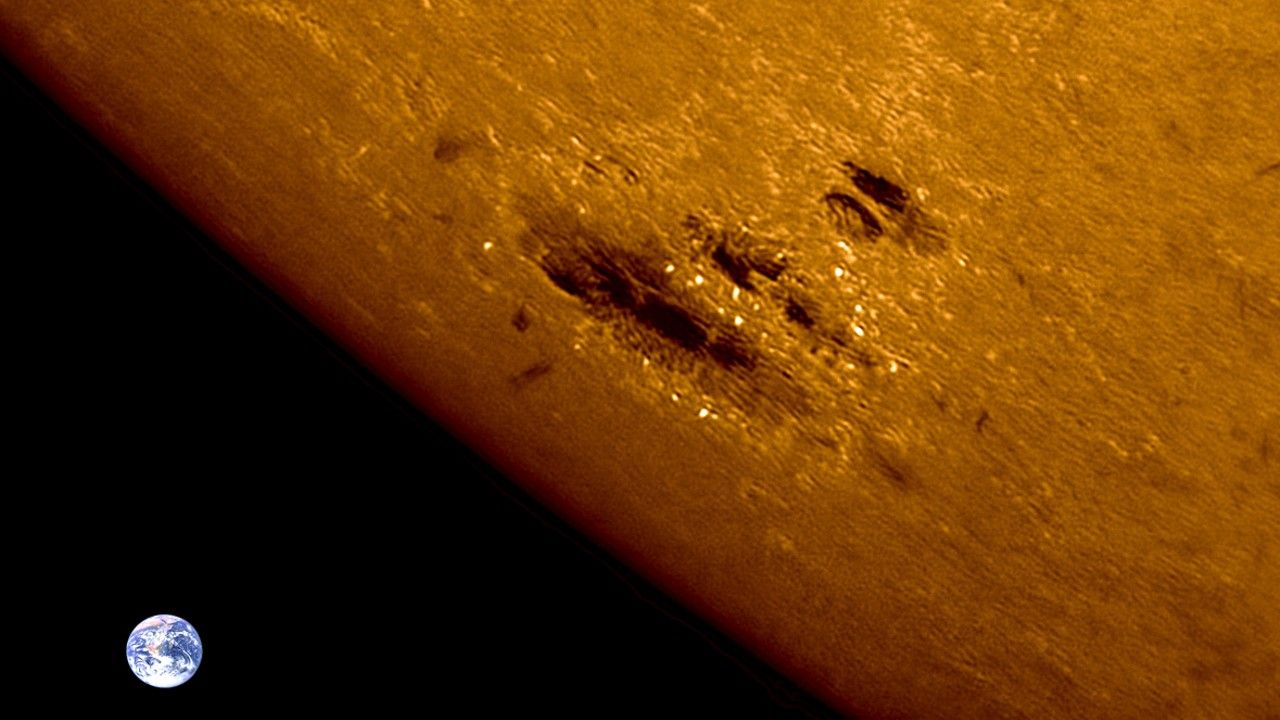 Sunspot crackling with magnetic 'bombs' is now turning toward Earth (photo)