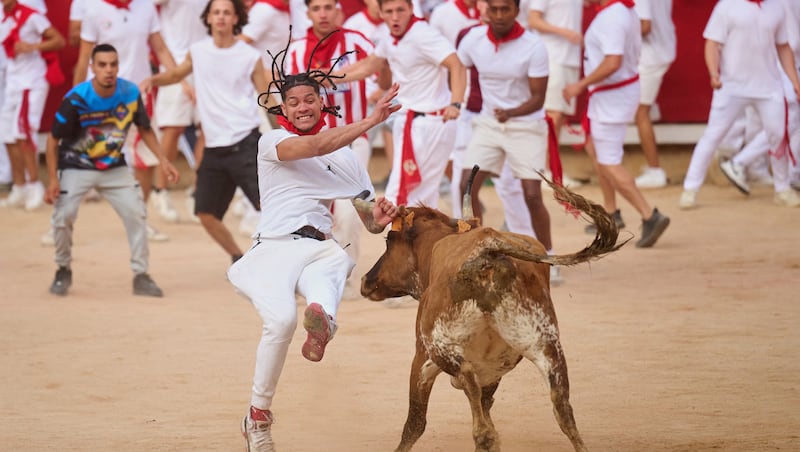 Photo gallery: Revelers run with the bulls in Pamplona