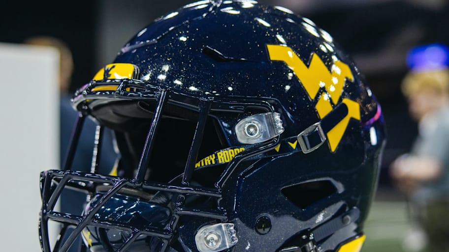 WVU Football Shows Off Glossy Blue Helmets in Full Uniform for the ...