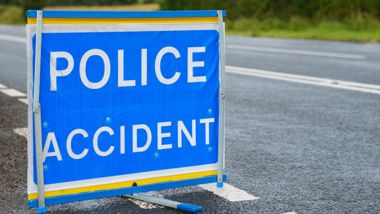 Amazon driver dies after van hit by train at level crossing