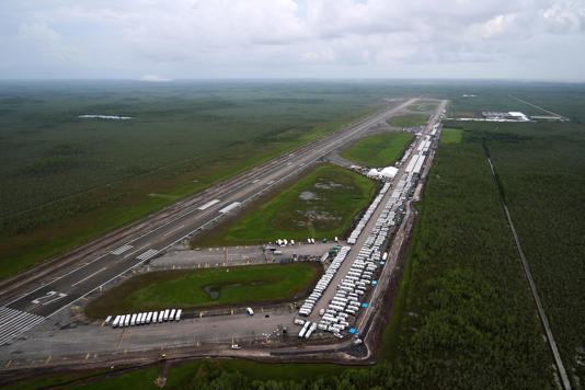 On Saturday Florida lawmakers from both parties took a state-arranged tour of the new 3,000-bed detention center that the state rapidly built on an isolated airstrip surrounded by swampland in the Everglades (AP)