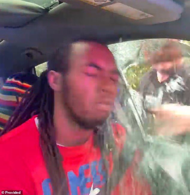Shocking shows cop punching driver in the face during explosive traffic stop