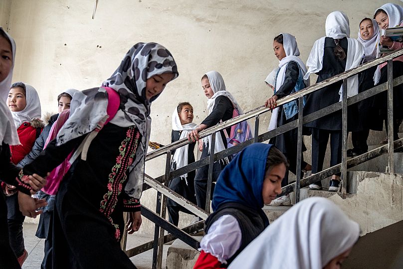 Girls attend school on the first day of the new school year in Kabul, 25 March, 2023 AP Photo