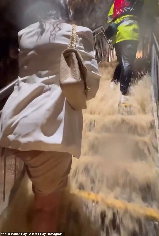Tourists flee for lives as cave floods in torrential downpour - amid half a month's rain in an hour