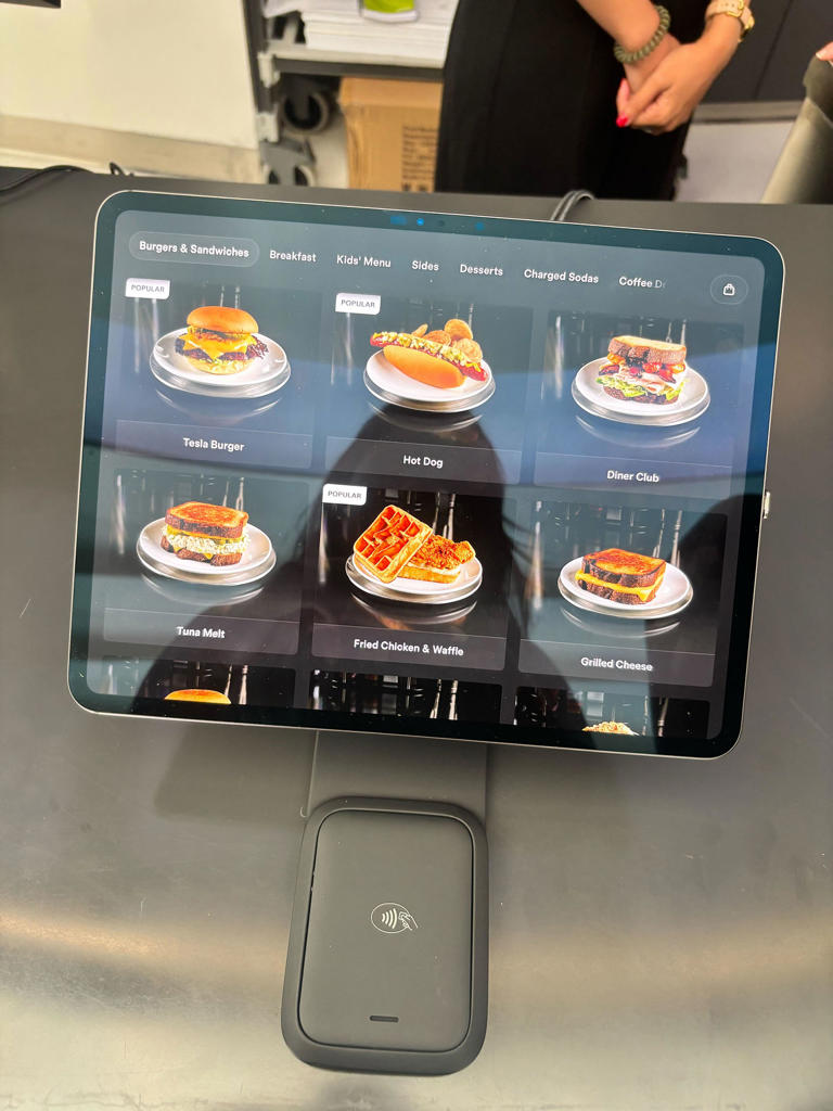 The Tesla menu screen at the Tesla Diner in Los Angeles on Monday. (Angela Yang / NBC News)