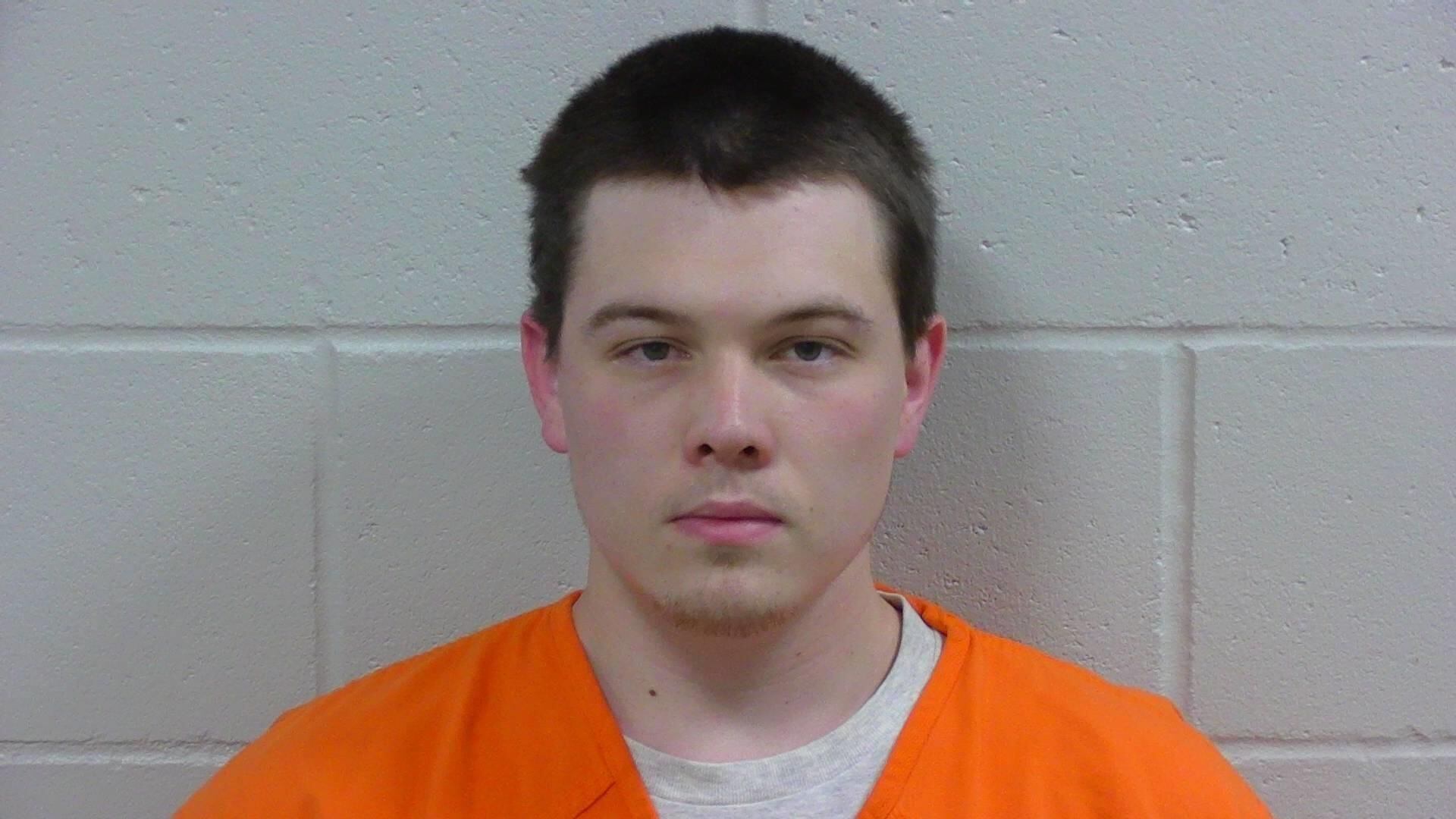 Jackson County corrections officer pleads not guilty in domestic abuse case