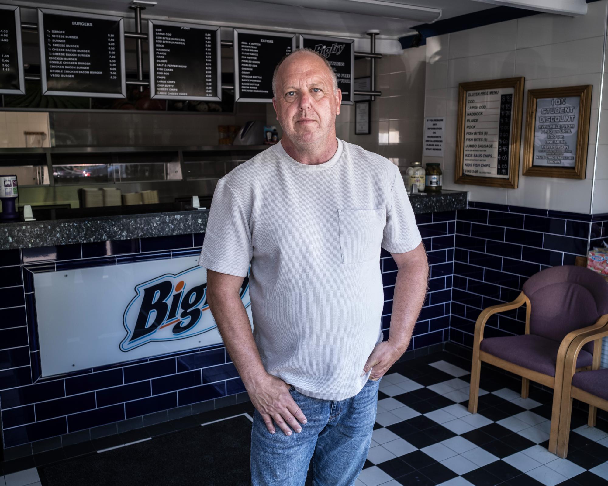 Mark Sullivan in Big Fry Fish & Chips in Egham, Surrey. Photograph: Sean Smith/The Guardian