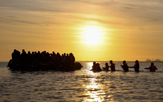 Migrants leave France last week from Gravelines, near Calais - Gonzalo Fuentes/Reuters