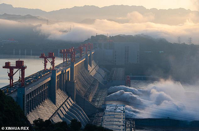 Photo taken on July 27, 2020 shows floodwater being discharged from the Three Gorges Dam in central China's Hubei Province