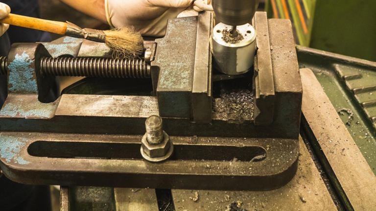 What Are The Slots In The Base Of A Drill Press For?