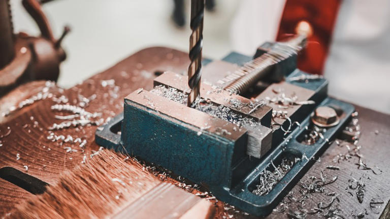 What Are The Slots In The Base Of A Drill Press For?