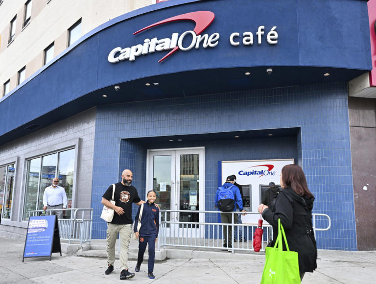 Mclean, Va.-based Capital One posted a loss of $4.28 billion, or $8.58 a share.