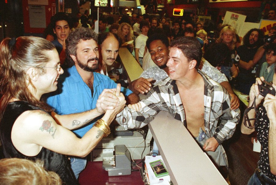 Rocker Ozzy Osbourne greets fans at Tower Records in downtown Manhattan, New York, Sept. 17, 1991 while kicking off the release of his new album “No More Tears.” Osbourne surprised the crowd of some 200 people gathered at the store to purchase the long awaited Guns and Roses albums “Illusion I” and “Illusion II” which went on sale at midnight. (AP Photo/Luiz Ribeiro)