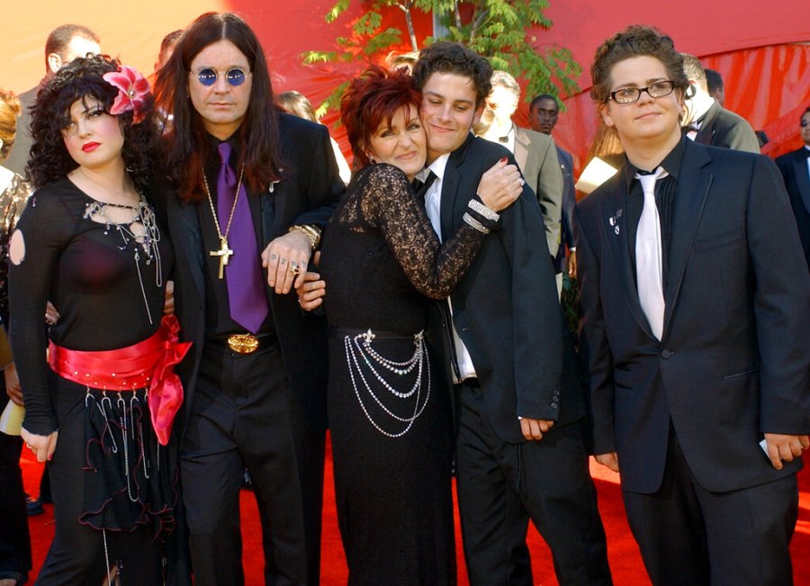 The Osbourne family pose as they arrive at the 54th Annual Primetime Emmy Awards Sunday, Sept. 22, 2002, at the Shrine Auditorium in Los Angeles. From left are Kelly, Ozzy, Sharon, Robert Marcato and Jack. Marcato is an 18-year-old friend of Kelly’s who recently moved in with the family after his mother died of the same type of cancer afflicting Sharon. (AP Photo/Laura Rauch)