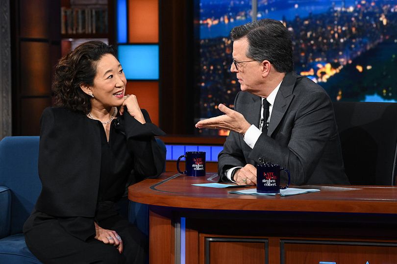 Sandra Oh wishes 'plague' on CBS as she consoles Stephen Colbert on Late  Show