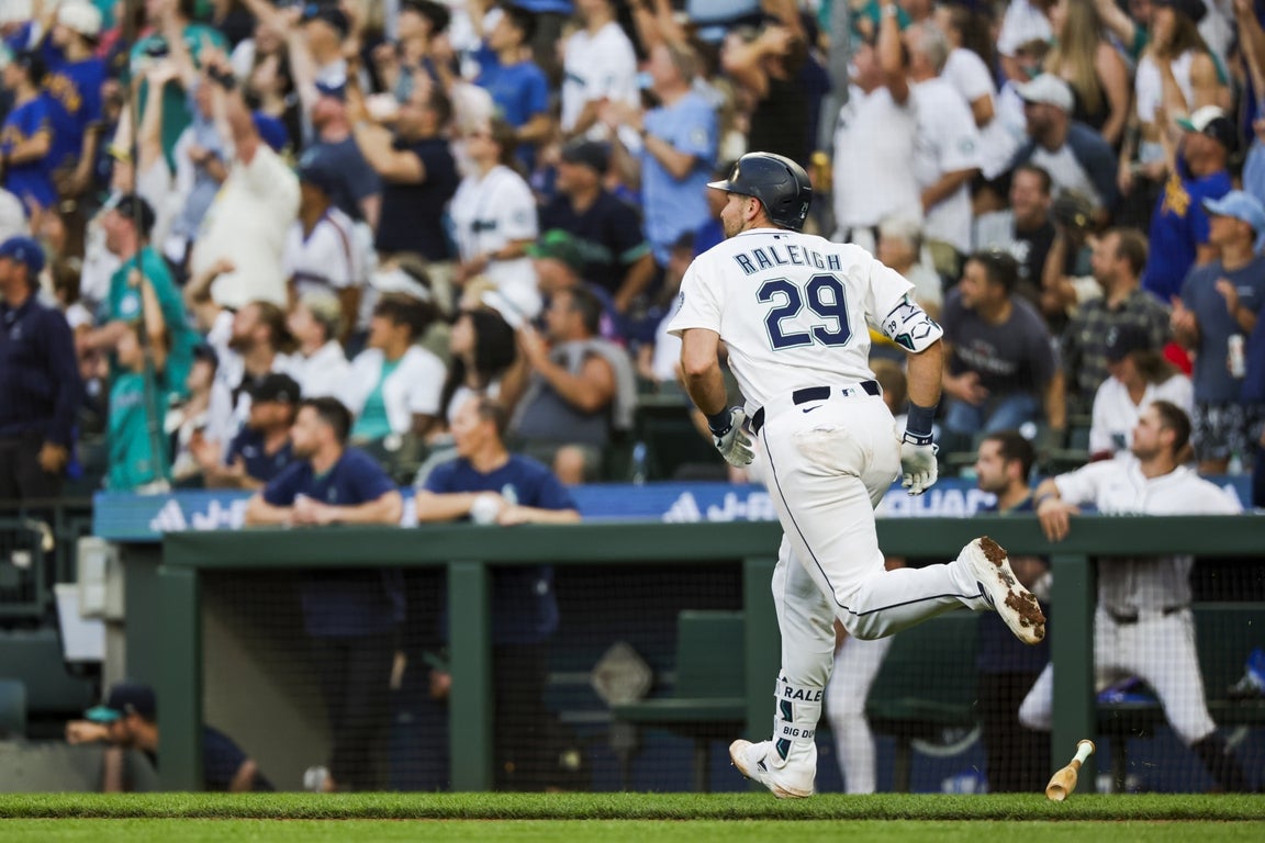 Incredible photos capture Cal Raleigh's torrid home run pace