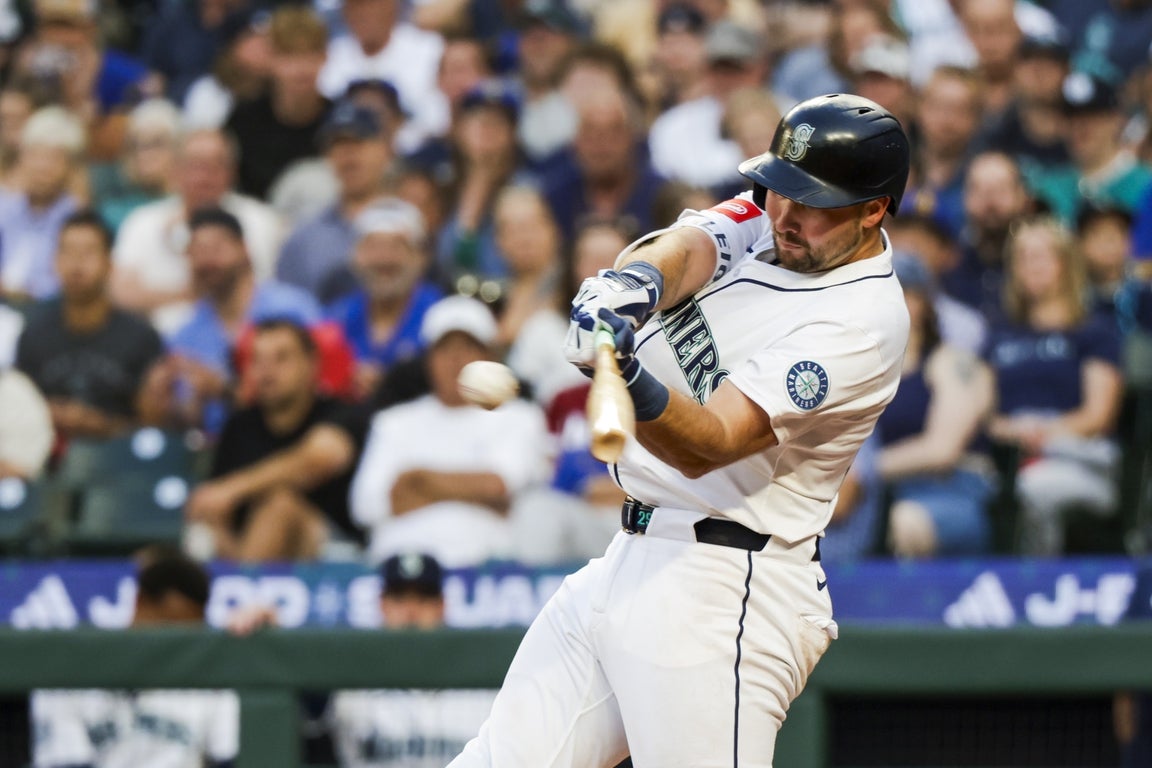 Incredible photos capture Cal Raleigh's torrid home run pace